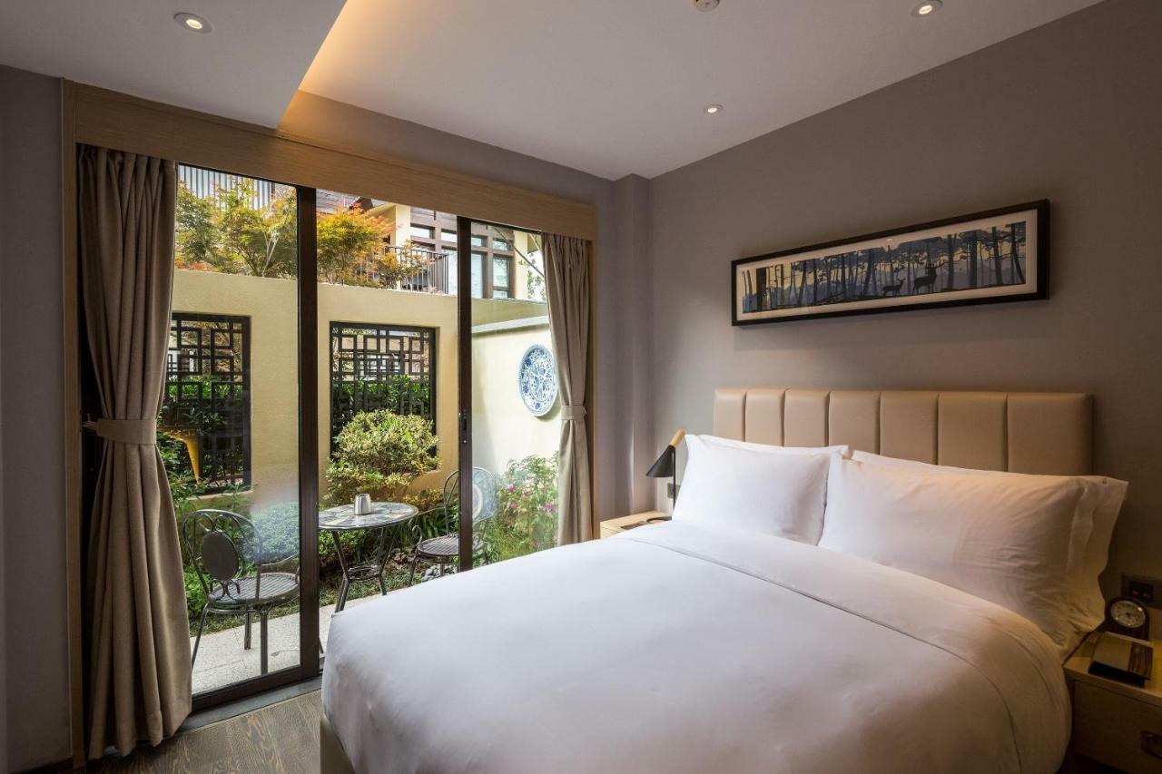Howard Johnson Jinlin Plaza Lijiang Ліцзян Екстер'єр фото